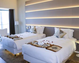 Sanya Phoenix Airport Hotel - Sanya - Habitación