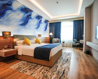 Mövenpick Grand Al Bustan Dubai - Dubai - Sovrum