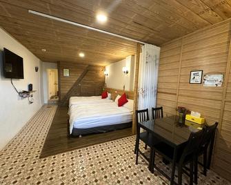 Jianan B&B - Ruifang District - Schlafzimmer