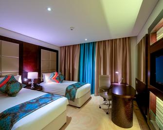 Holiday Inn Muscat Al Seeb - Muscat - Bedroom