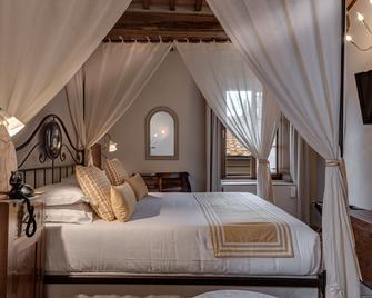 Palazzo Del Capitano Wellness & Relais - Luxury Borgo Capitano Collection - San Quirico d'Orcia - Спальня