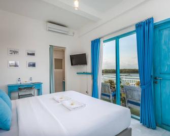 Paras Paros Marina Lodge - South Kuta - Bedroom