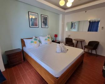 Aqua Travel Lodge - El Nido - Slaapkamer