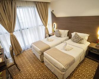 Lamar Ajyad Hotel - Mecca - Bedroom