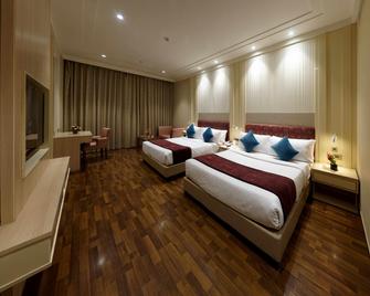 Palm Green Hotel & Resort - Nueva Delhi - Habitación