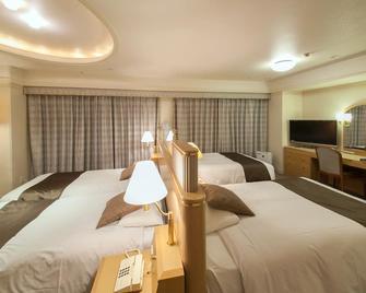 Matsuyama Tokyu Rei Hotel - Matsuyama - Bedroom