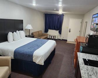 Budget Host Inn - Jourdanton - Schlafzimmer