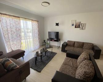 Spacious vacation place in Bavaro-Punta Cana 10 min from the airport - Bávaro - Sala de estar