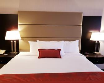 Ramada by Wyndham Saskatoon - Saskatoon - Schlafzimmer