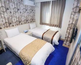 Da San Tong Hotel - Chiayi - Habitación