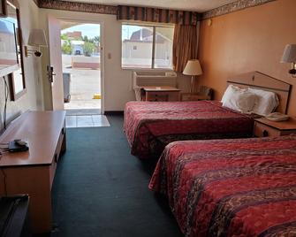 Night Inn - Globe - Schlafzimmer