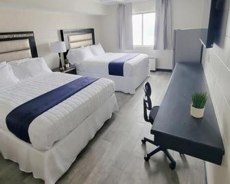 Guest Lodge - Minot - Habitación
