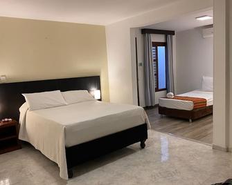 Tama Hotel Granada Real Cali - Cali - Slaapkamer