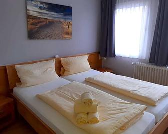 Weinhaus Hotel - Norddeich (Niedersachsen) - Спальня
