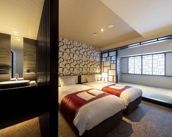 Hotel Rosso Karuizawa - Karuizawa - Ložnice
