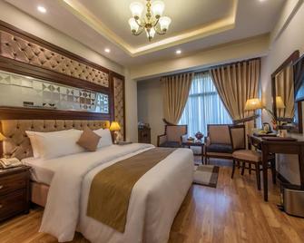 Envoy Continental Hotel - Islamabad - Bedroom